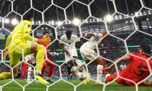 Here’s a view of Salisu’s finish from behind the net. Photograph: Kai Pfaffenbach/Reuters