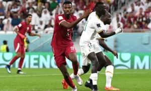 Mohammed Muntari scores the first ever final goal for Qatar. Photograph: Claudio Villa/Getty Images