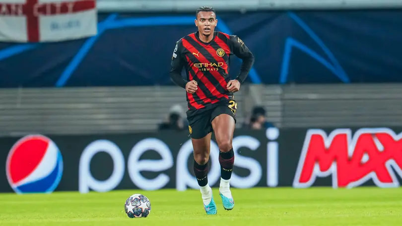 Manuel Akanji heading forward against RB Leipzig in the UEFA Champions League last 16 first leg 