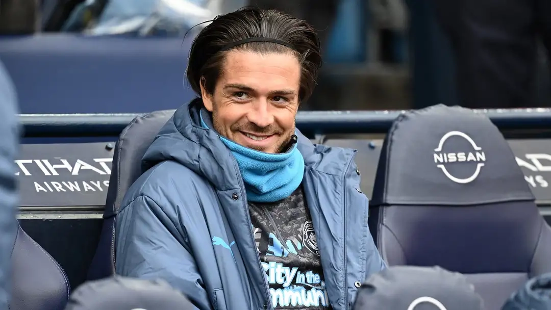 Jack Grealish sitting on the bench